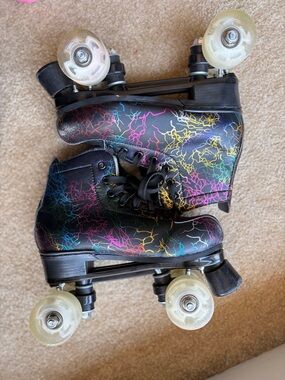 Black Roller Skates with Neon Lightning Graphic